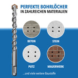 Betonbohrer neben Materialproben aus Beton, Stein, Putz und Mauerwerk